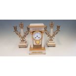 A Maple & Co. Ltd white marble and ormolu mantel clock with four columns