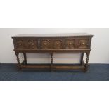 A Thomas Clarkson & Son oak three drawer Jacobian style dresser base. IMPORTANT: Online viewing