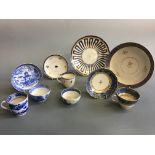 Ten pieces of English blue and white porcelain in various patterns including Chinoiserie landscapes,