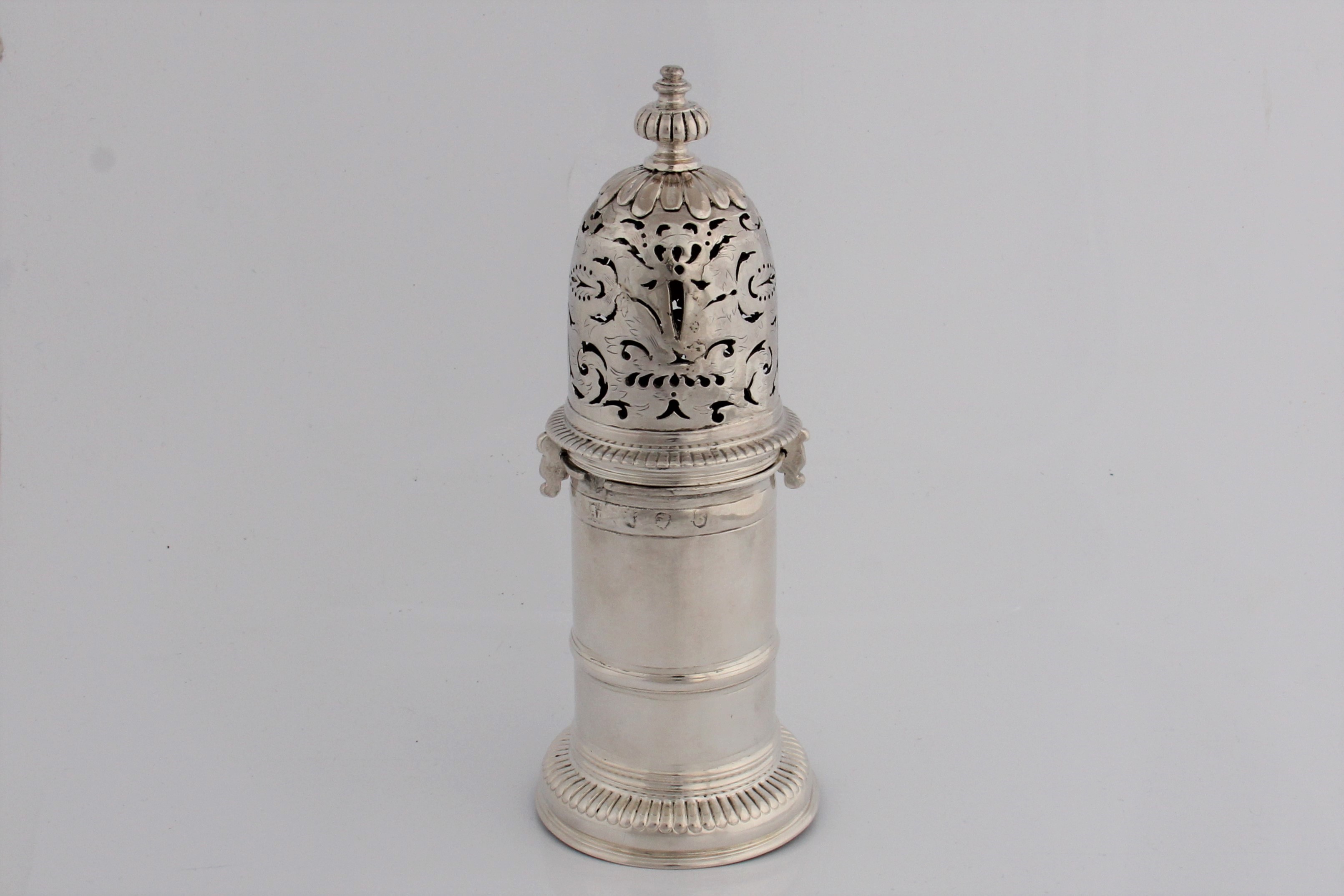 A circa 1700 early silver sugar caster with worn marks for London and AD