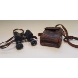 A Huet Paris pair of military binoculars in soft leather case. IMPORTANT: Online viewing and bidding