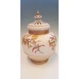 A Royal Worcester lidded pot pourri pot, model no. 1286, decorated with gilding and sprays of