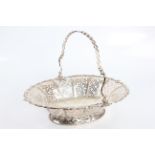 A George IV silver basket with loop handle