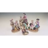 Four Meissen figurine groups, including boy with dog, girl and boy with sickle, boy with girl seated