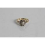 A yellow gold diamond cluster ring, marked 18ct, ring size, K 1/2, approx. weight 2.43gms. Online