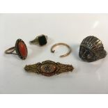 A 9ct yellow gold Victorian brooch with a silver Indian Chief design ring, unmarked gemstone ring