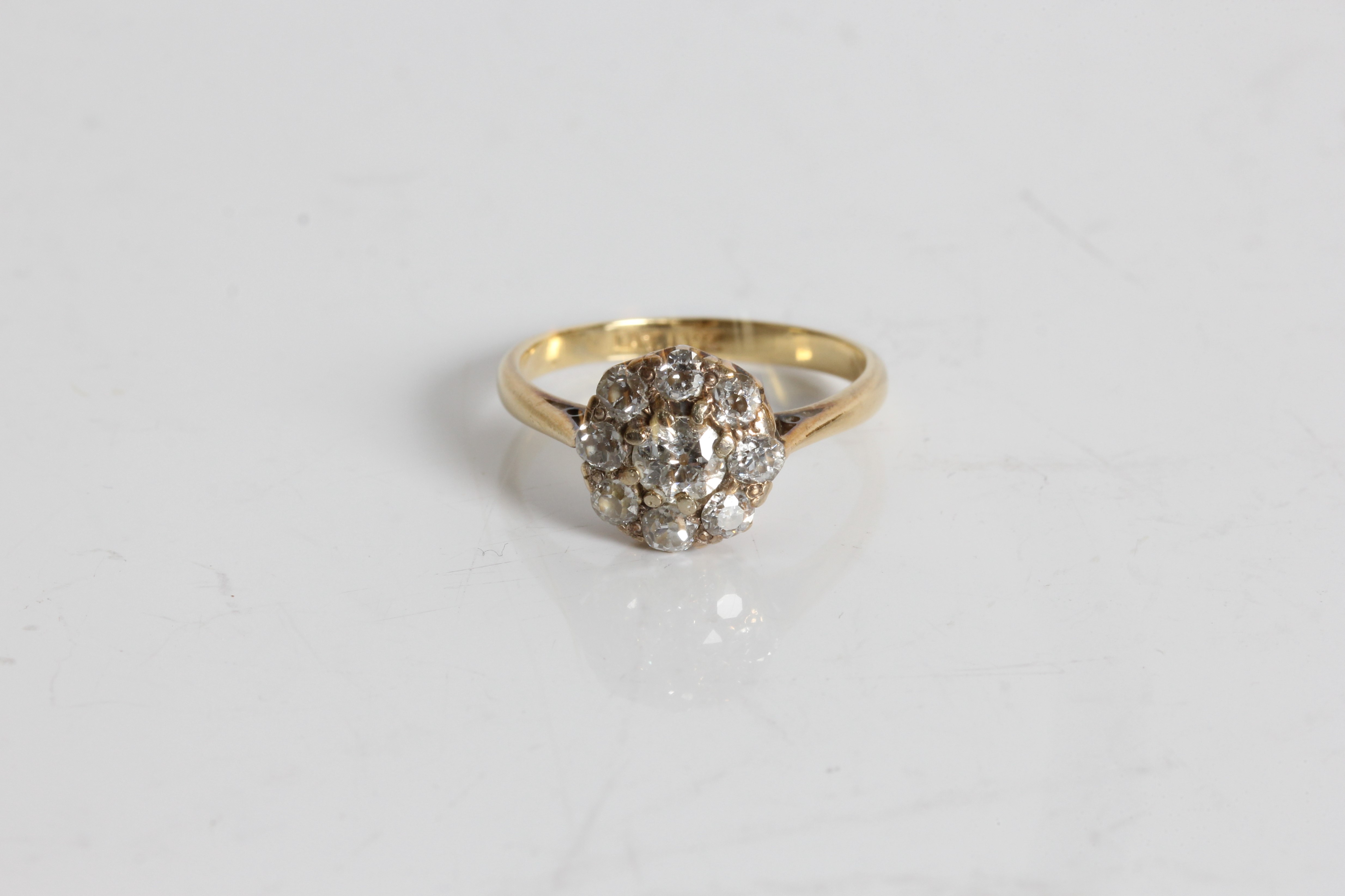 A yellow gold diamond cluster ring, marked 18ct, ring size, K 1/2, approx. weight 2.43gms. Online - Image 3 of 3