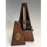 A Maezel Paquet metronome. IMPORTANT: Online viewing and bidding only. No in person collections,