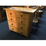 A modern golden oak chest of two and four short drawers. IMPORTANT: Online viewing and bidding only.