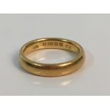 A 22ct gold yellow gold wedding band ring stamped 22, size I 1/2, approx. weight 5.1gms. Online