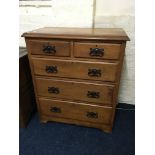 A satinwood three long and two short drawer chest with metal handles. IMPORTANT: Online viewing