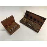 Two sets of weights ranging from 1g to 200g in wooden cases. IMPORTANT: Online viewing and bidding