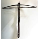A 19th century hunting crossbow, approx. length 80cm. IMPORTANT: Online viewing and bidding only.