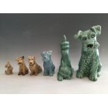 Six Sylvac figurines including five dogs and ones cat, in varying sizes and colours. IMPORTANT: