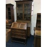 An oak bureau and bureau bookcase. IMPORTANT: Online viewing and bidding only. Collection by