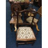 A collection of five various chairs to include a pair of rosewood chairs, corner chair, carver