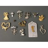 Eighteen Jonette Jewelry angel pin brooches and six pin badges. Online viewing and bidding only.