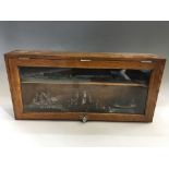 Twelve trench art model battleships in glass fronted case. IMPORTANT: Online viewing and bidding