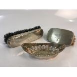 Two silver combs together with a pierced dish, 5cm x 15cm x 8cm, approx. total weight 370gms. Online