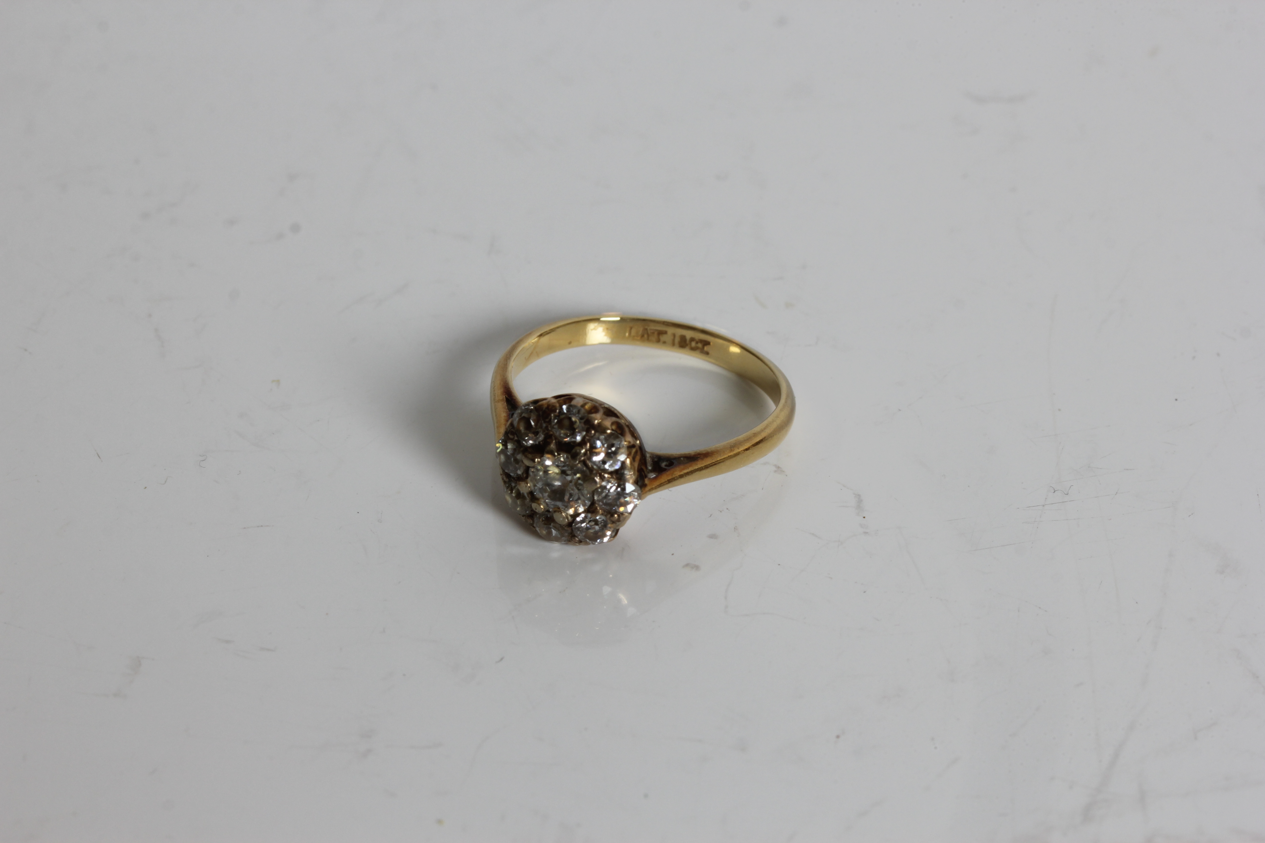 A yellow gold diamond cluster ring, marked 18ct, ring size, K 1/2, approx. weight 2.43gms. Online - Image 2 of 3