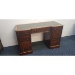 A Victorian mahogany nine drawer desk with green leather insert top. IMPORTANT: Online viewing and