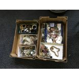 Two boxes of various costume jewellery. IMPORTANT: Online viewing and bidding only. Collection by