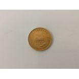 A 1974 1oz fine gold Krugerrand. Online viewing and bidding only. No in person collections, an