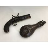 A pistol marked ‘Nunn’, length 21cm, with a powder flask. IMPORTANT: Online viewing and bidding