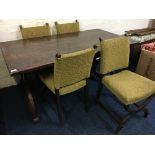 An oak refectory table on x framed base with four matching chairs. IMPORTANT: Online viewing and
