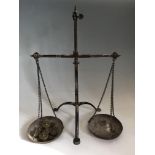 Set of weighing scales with nine weights. IMPORTANT: Online viewing and bidding only. No in person