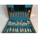 A Kaniade silver plate cutlery set in wooden box with Coronet silver plated tray, diameter 30.5cm.