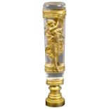 An attractive late 19th Century French crystal and gilt seal, the oval section handle overlaid in