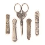 Three continental silver needle cases, of shaped and decorated form, largest 7cm., and a pair of