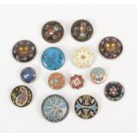 Buttons - fourteen 19th Century and later enamel buttons comprising a pair in floral enamel with