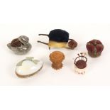 Six pin cushions and retainers, comprising a velvet and brass mounted crown, 4cm, a copper and brass