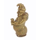 A brass novelty vesta case, in the form of Mr Punch, 5.2cm.