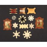 Thirteen thread winders, comprising a pair of French cardboard print decorated examples 'Fil