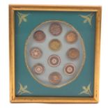 Buttons - a framed display of ten late 18th Century/early 19th Century 'colonial copper' or '