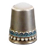 A Norwegian silver and enamel thimble by David Andersen, the beaded white dot enamel rim below a