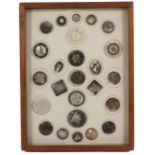 Buttons - a fine framed display of twenty five mother of pearl buttons, 18th Century and later