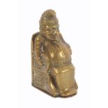 A brass novelty vesta case, in the form of Mr Punch seated in a chair, 6cm.Ê