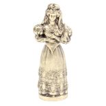 A mid 19th Century continental silver standing figural needlecase, in the form of a woman in