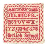 A good sampler form pin card, neatly worked in red with alphabet and numerals and inscribed 'British