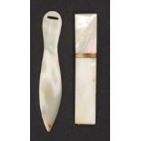 A mother of pearl needle case and ribbon threader, the needle case of rectangular form with gilt