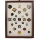 Buttons - a fine framed display of twenty five, including two 18th Century floral enamels with cut