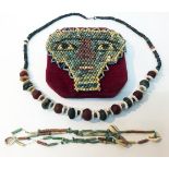 A collection of antiquities, Egyptian beadwork, comprising a panel of Egyptian beads arranged as