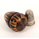 A Tunbridge stick ware thimble acorn, containing a silver thimble, 4.2cm.Ê