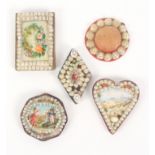 Four Victorian shell decorated pin cushions, and a needle book comprising an octagonal example
