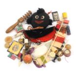 A mixed lot - sewing, comprising a golliwog pin flannel, 15cm, a turned boxwood reel and needle