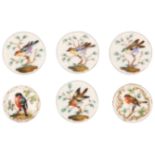 Buttons - six late 18th Century porcelain bird decorated buttons comprising a set of four painted